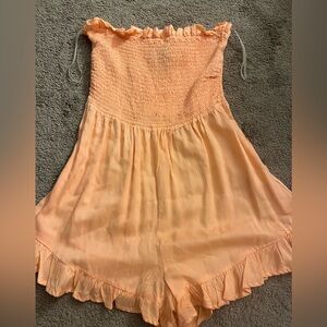 Peach Strapless Romper with Ruffle Hem